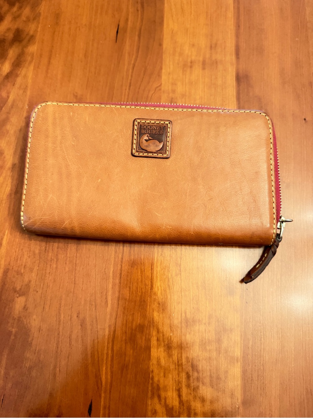 Dooney & Bourke Tan Leather Zip Wallet with Pink Zipper Trim